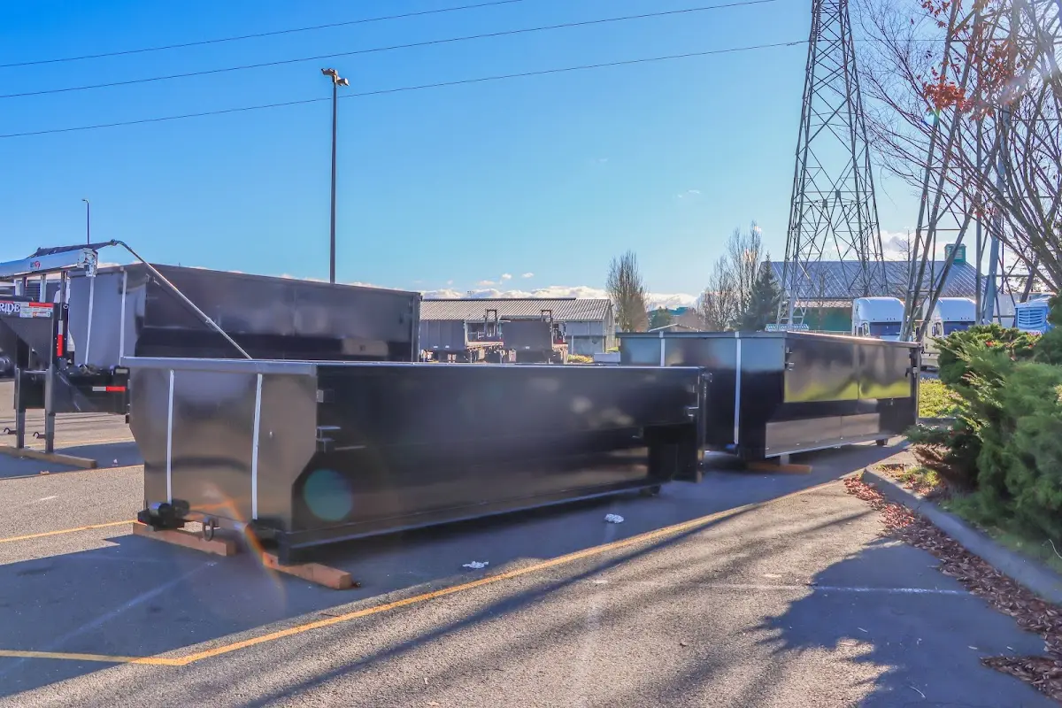 Roll-off dumpster ready for waste disposal at job site for Estate Cleanout Dumpster Rental in Garden City